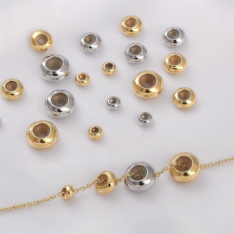 14k包みの金の平円のシリカゲルの位置決めの玉の調整のビーズのdiyの手作りのブレスレットのネックレスのアクセサリーの材料の部品|undefined