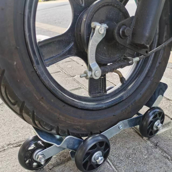 Motorcycle towing device, electric vehicle booster, tire repair kit, emergency swivel wheel, tire puncture self-rescue towing device