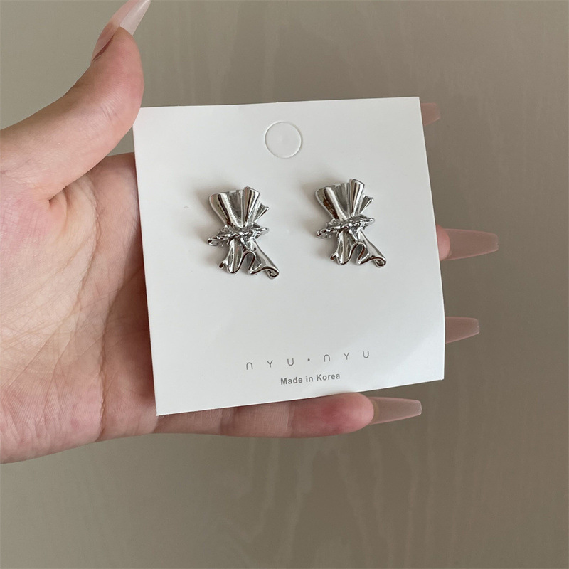 Folded Earrings Niche Design Bowknot Personality Silver Needle Earrings Korean Irregular Earrings display picture 2