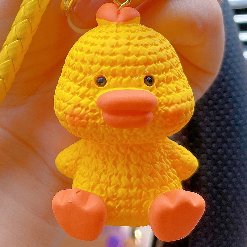 Portachiavi per auto squisito con ciondolo a forma di dinosauro, coppia creativa, piccolo anatra gialla in resina di cartone animato_voghion.com