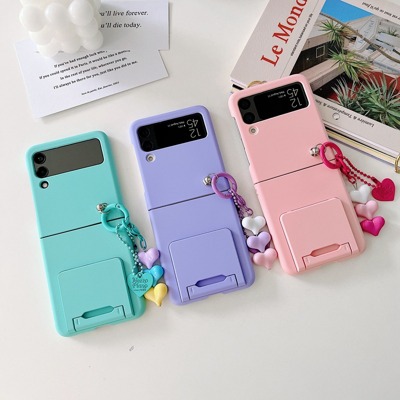 Adecuado para teléfono con pantalla plegable Samsung Z Flip4/3, soporte integrado, tacto suave, colgante de amor, funda protectora abatible._voghion.com