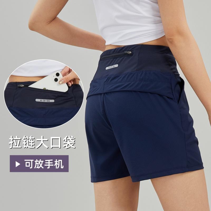 Pantalones cortos deportivos de mujer hielo rápido secado bolsillo de cintura trasero puede poner el teléfono móvil yoga pantalones casuales sueltos corredores cortos comercio exterior