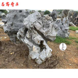 太湖石带窟窿图片，太湖石原产地供应商，绿化假山石材出售