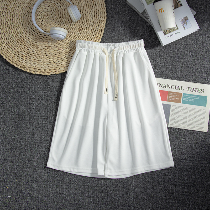 Hombre de verano casual holgado coreano waffle pantalon transpirable universal juvenil retro americano pantalones de cinco puntos