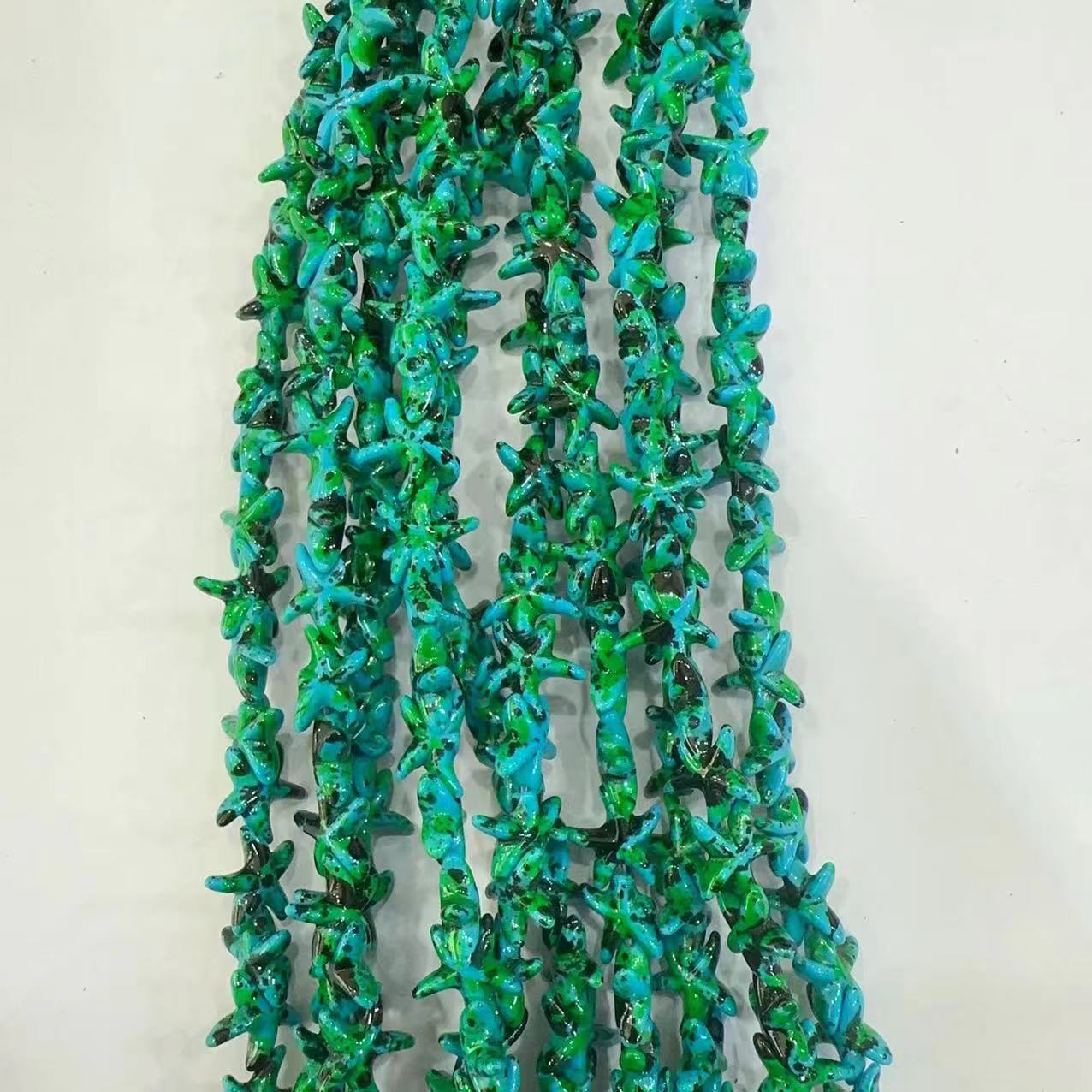 Ventas transfronterizas de coloridas estrellas de mar de piedra de pino cuentas semiacabadas DIY accesorios accesorios materiales de joyería hecha a mano