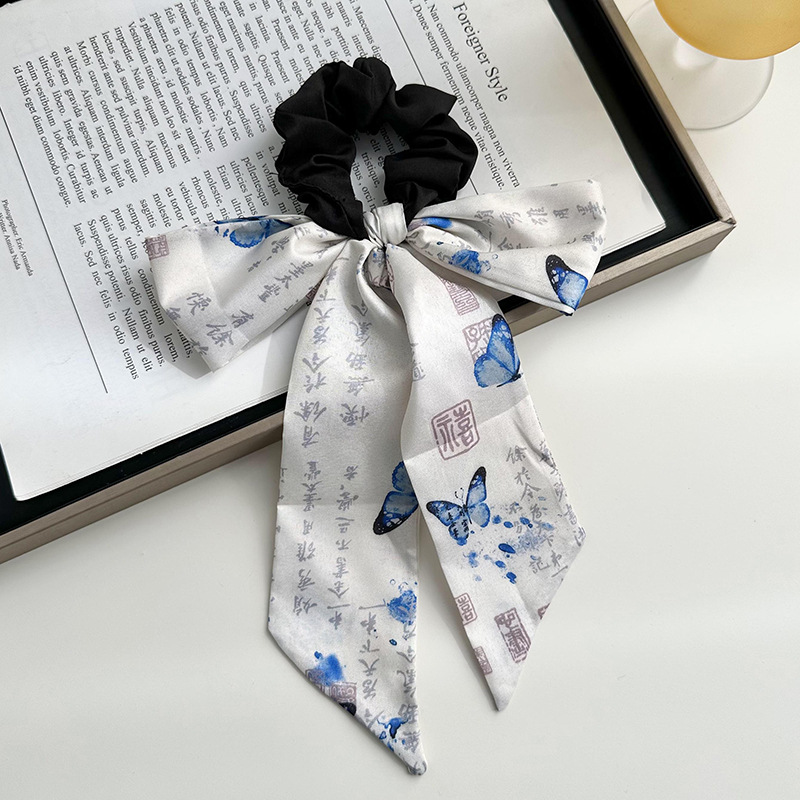 Anillo de cabello de arco femenino retro elegante correa francesa temperamento de alta sensación de impresión de anillo de intestino suave tocado versátil