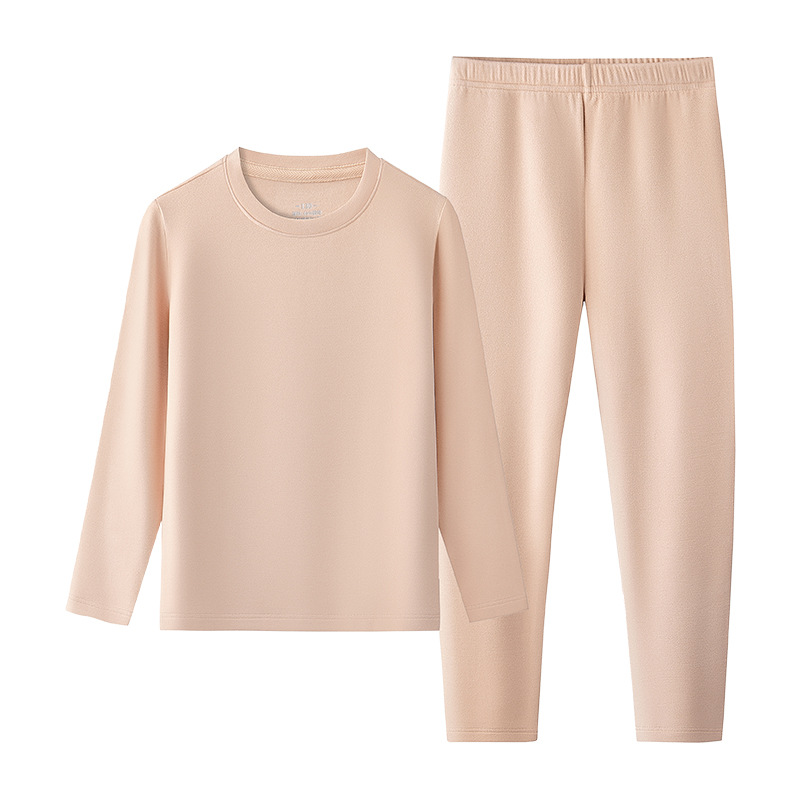 La ropa interior térmica para niños y niñas de otoño e invierno de terciopelo caliente de Tensi puede salir y agregar un traje de base engrosado de terciopelo