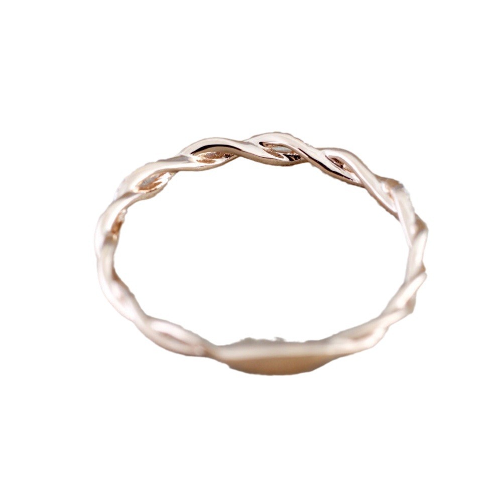 Ring with pigtail