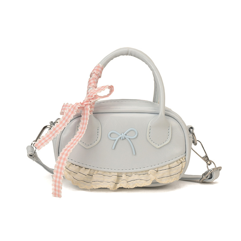 2026 nuevo bolso coreano para niños bolso de encaje de estilo extranjero bolso adorable arco bolso accesorios de niña pequeña