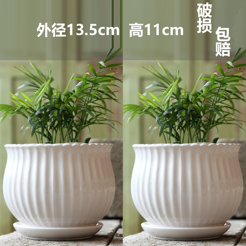 Two medium-sized, pure white, artistic pink leaf planters / No specifications