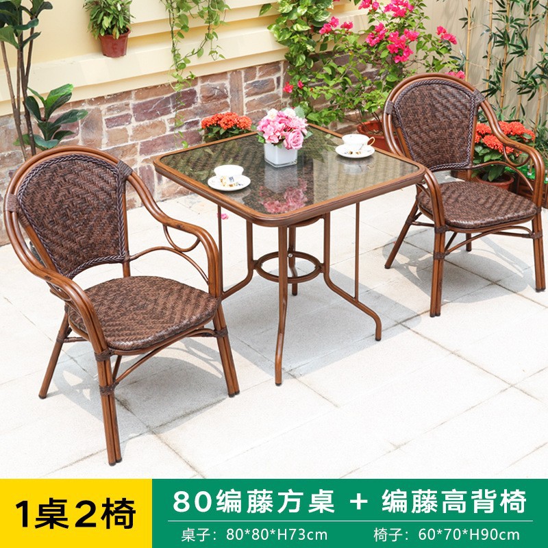 Mesa y silla de caña tejida al aire libre mesa de comedor de ocio al aire libre mesa de té impermeable café leche mesa de té silla de caña tres piezas image 10