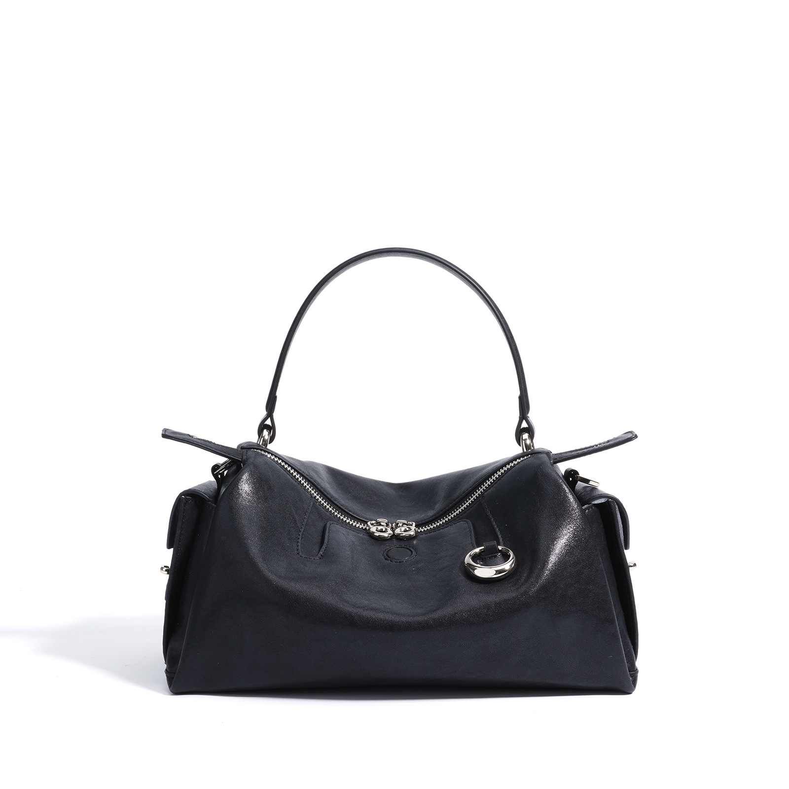 2025 nuevo bolso de cuero de gama alta de nicho bolso de almohada de viajero simple de moda bolso de mensajero de axila de textura mujer