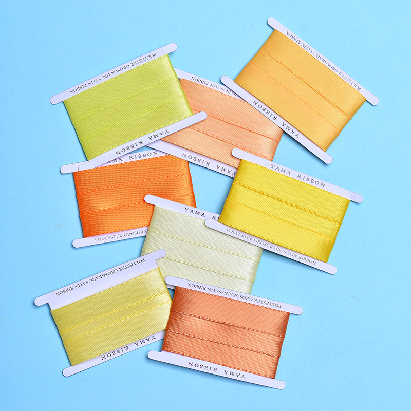 En stock Yao Ming cinta de raso arco cinta pastel caja de regalo de embalaje accesorios de ropa cinta de poliéster al por mayor