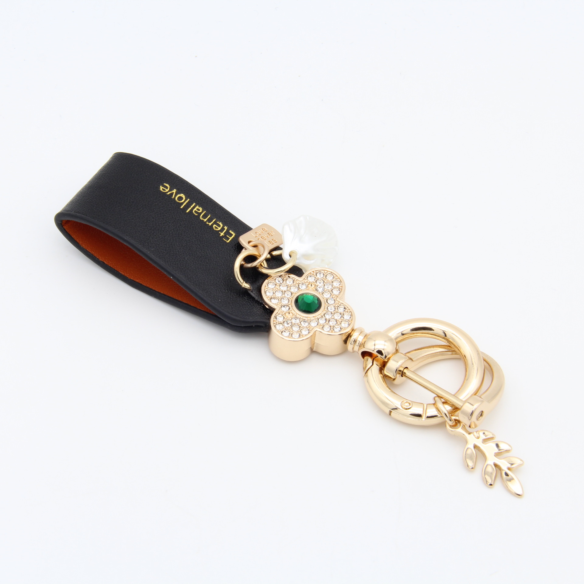 Trébol de estilo francés llavero de coche de piel de oveja llavero de alta gama personalizado simple colgante de flor de diamante de las mujeres