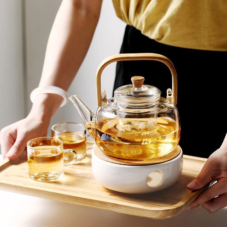 Los fabricantes venden al por mayor vidrio resistente al calor con alto contenido de borosilicato, olla de vigas de bambú y madera, estufa de cerámica eléctrica de gran capacidad, tetera de té de calentamiento