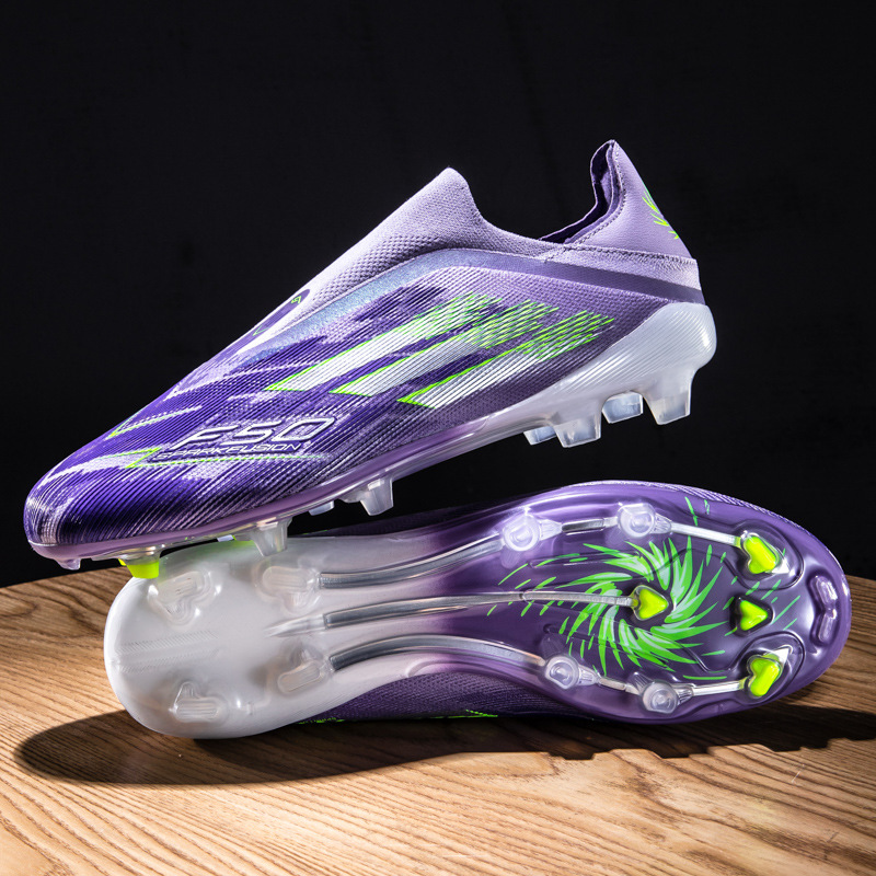 Nuevos zapatos de fútbol juveniles sin costura de tejido sin lazos de entrenamiento de césped profesional zapatos de fútbol transfronterizos al por mayor