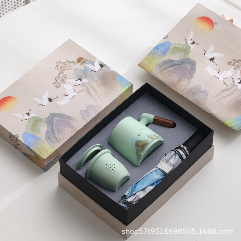 Taza de cerámica Jiangshan set de regalo de taza de marca de filtro de taza de agua de negocios de talla LOGO publicidad al por mayor