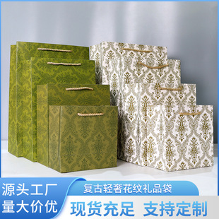 Factory in stock white card handbag large capacity clothing shopping bag hand gift birthday gift packaging paper bag wholesale