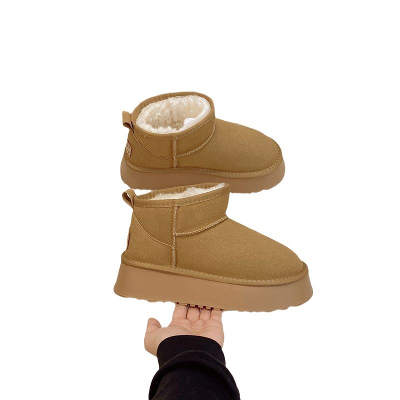 Botas de nieve de fondo grueso para mujeres 2024 nuevos zapatos de invierno de invierno pieles de tubo corto en una piela de lana gruesa zapatos de algodón