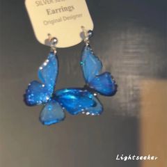 夢幻の清冷感の青い蝶のイヤリングの甘い風のファッションの気質の小さい清新なファッションの百合の耳のアクセサリーの卸売り