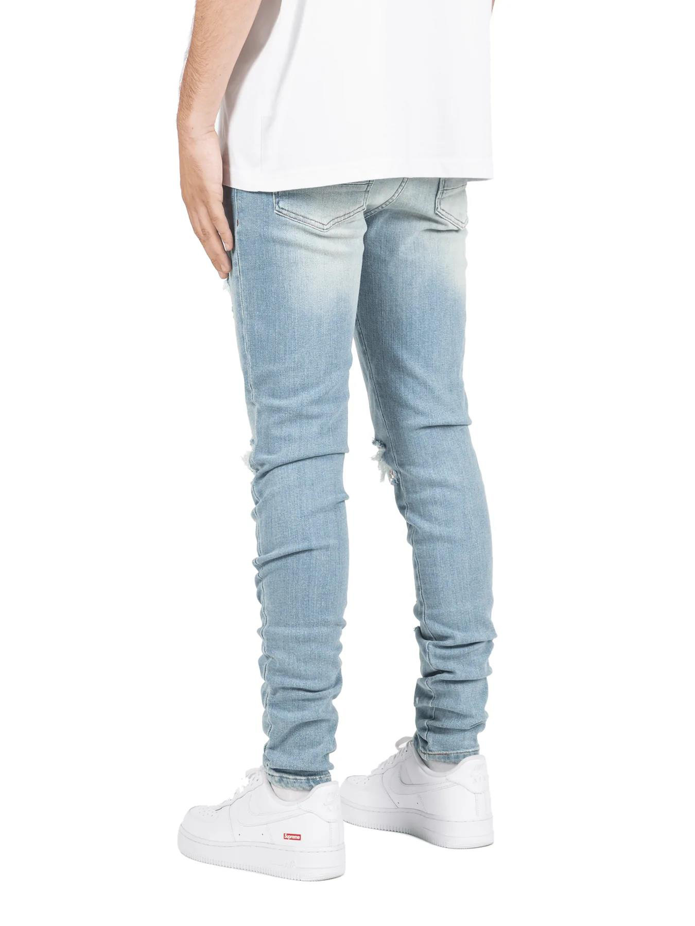 Stazione di abbigliamento maschile stile caldo pantaloni strappati con toppa e gamba piccola autunno e inverno jeans attillati e aderenti strappati da uomo_voghion.com