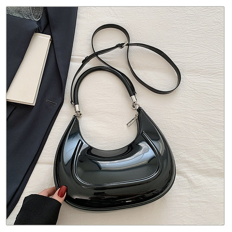 Bolso de luna nueva portátil de alta calidad bolso de mujer 2025 transfronterizo sudeste asiático nuevo estilo color gelatina bolso de mensajero de lujo ligero