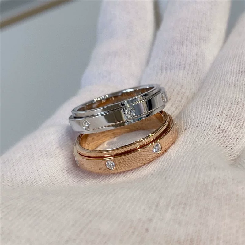 Кольцо V золото, позолота розовым золотом 18K и варианты из серебра, вращающийся круг с бриллиантом, один камень или 7 камней (размеры 5–10)