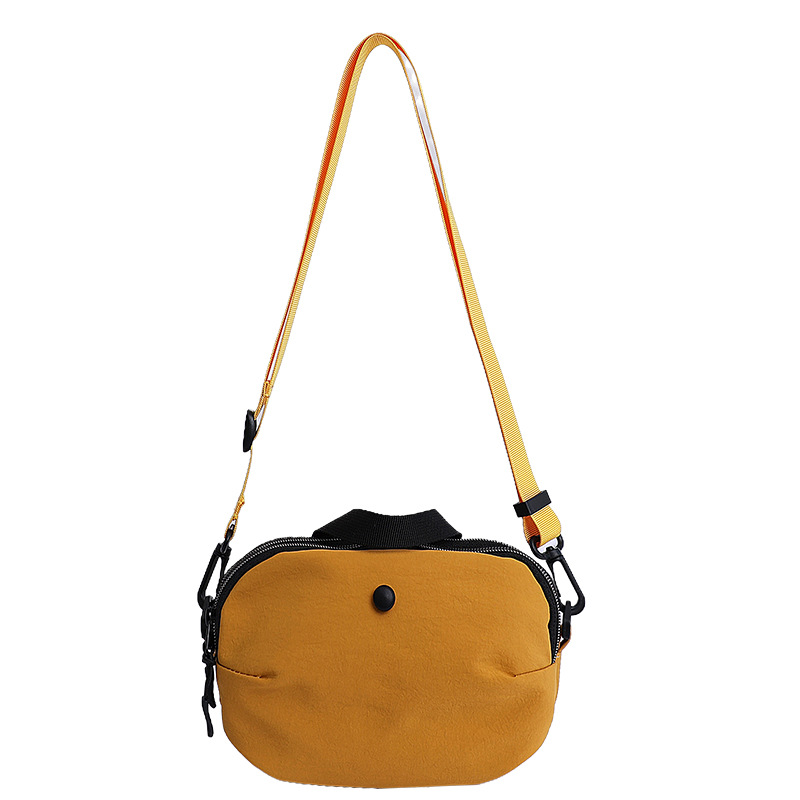 Bolsos pequeños de moda coreana 2025 verano nuevo estilo bolso femenino bolso de lona simple bolso de hombro casual bolso de mensajero con correa de hombro ancha
