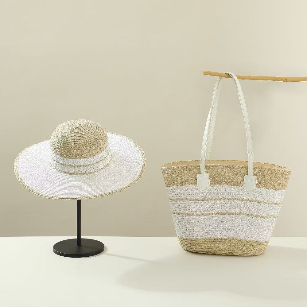 El nuevo bolso de sombrero de paja de verano tiene dos juegos de sombreros de sol de viaje al aire libre de alta gama de moda con bolsos de paja de temperamento.