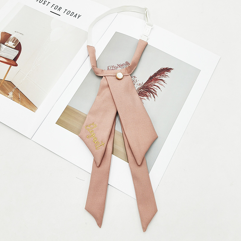 Fabricante spot color sólido jk pajarita versión coreana femenina estilo universitario arco foto de graduación traje de soltero bordado cuello flor serpentina