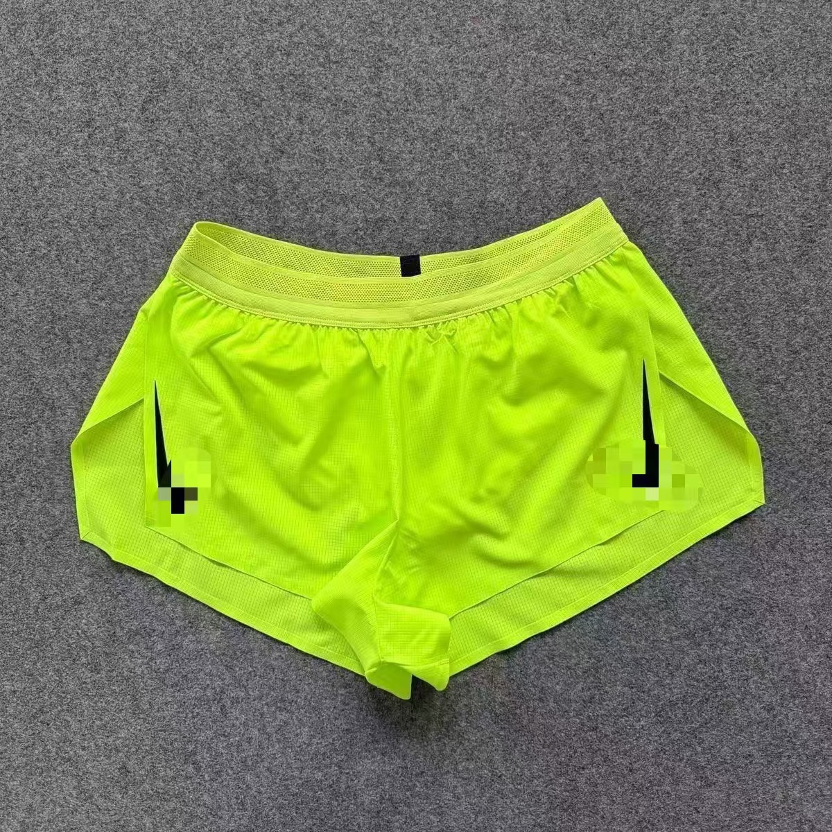 Fluorescent green three-quarter pants (black hooks on both sides)