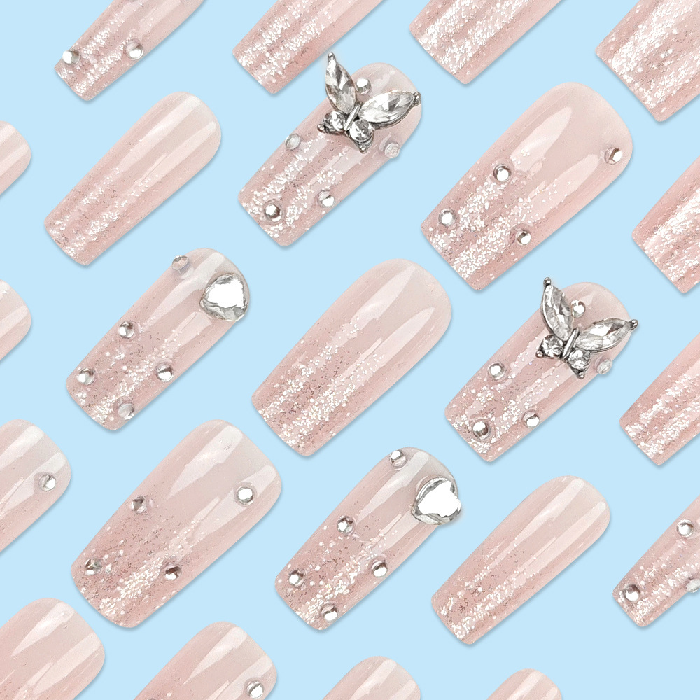 Europa y los Estados Unidos explotaron amor diamante de manicuras, flash dulce y cool usar uñas simples mariposa manicuras falsas productos al por mayor