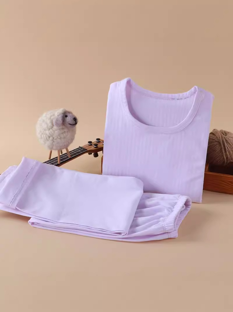Nueva ropa infantil para el hogar sin huesos pijamas de manga larga primavera y otoño ropa de aire acondicionado de niñas algodón hombre