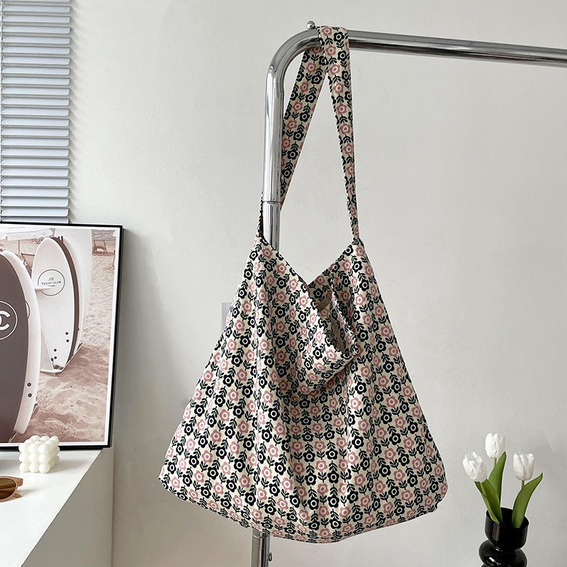 Diseño nicho bolsas de lona para mujeres 2025 nueva gran capacidad coreana estampado de leopardo flor de hombro impresa bolsas de mujer