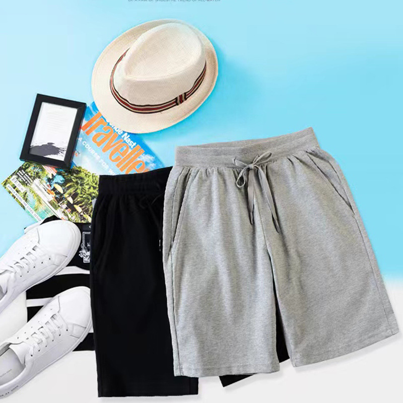 Pantalones cortos masculinos de Nueva tendencia, pantalones cortos casuales de moda, pantalones de algodón de cintura media, pantalones de cintura media de color sólido, impresión al por mayor de la fábrica de pantalones juveniles micro - bomba