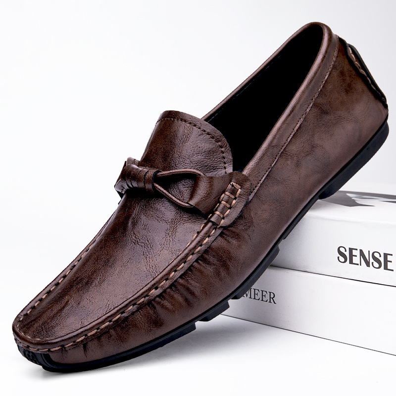 Zapatos de hombre de cuero real 2025 nuevos zapatos de negocios británicos transpirables con suela suave zapatos casuales perezosos con un pie zapatos para hombre