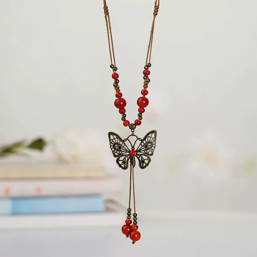 1 Piece Ethnic Style Tassel Butterfly Alloy Mixed Materials Knitting Women's Necklace display picture 6