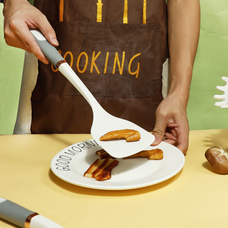 Mango de anillo de oro de silicona no pegajoso de silicona de grado alimenticio utensilios de cocina de silicona en stock