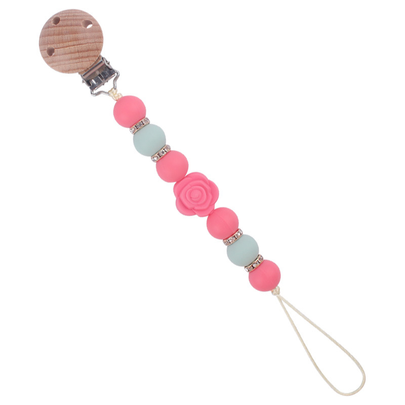 Nuevo bebé de dibujos animados de doble cara Rosa mordedor creativo DIY flash cuentas de ladrillo silicona mordedura pezón cadena anti-caída