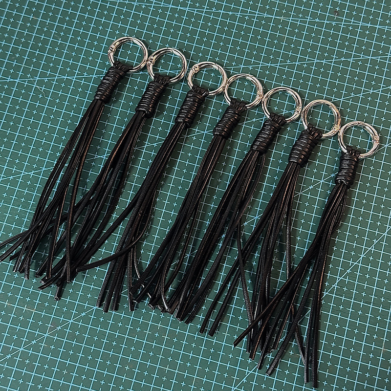 Handmade Tassel Leather Pendant, Leather Woven Bag Charm, DIY Accessory with a Cool Texture, Keychain Wholesale Handmade Tassel Leather Pendant, Leather Woven Bag Charm, DIY Accessory with a Cool Texture, Keychain Wholesale