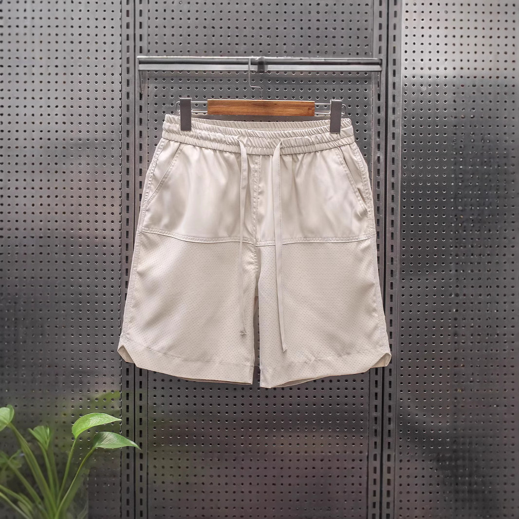 2025 Summer Solid Color Simple Five-Point Casual Pants Men's Laser Perforated Sports Shorts Trendy Loose Quick-Drying Pants