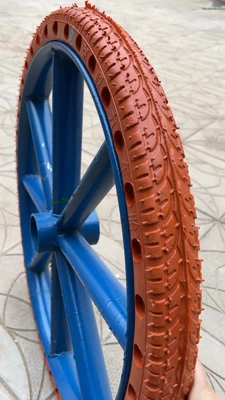 trucks, Non-industrial tires - rim-red-solid-tire-with-large-holes-model-26x212