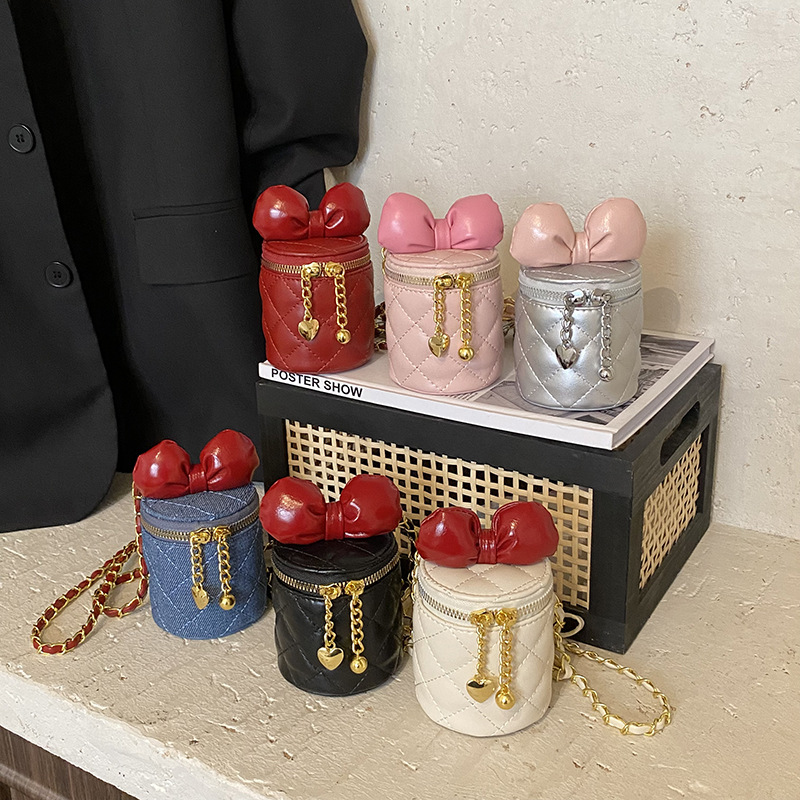 Bolsos de cubos para niños coreanos lindos arcos mini bolsos de hombro para bebés de estilo extranjero bolsos de cadena para hombres y mujeres