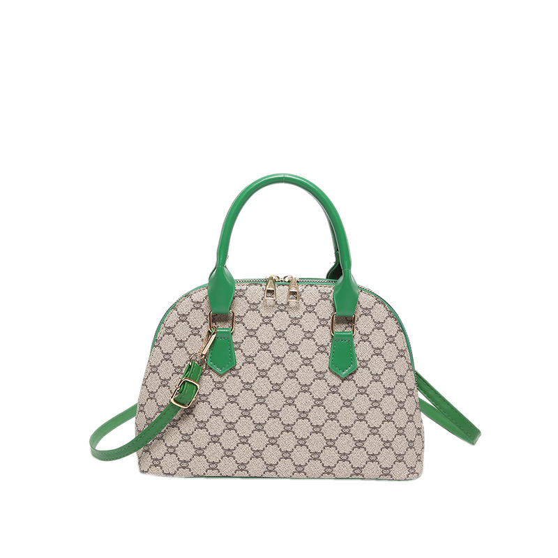 Bolso de moda simple 2024 primavera nueva bolsa de hombro de viaje de estilo extranjero bolso de mano casual bolso de concha de mujer