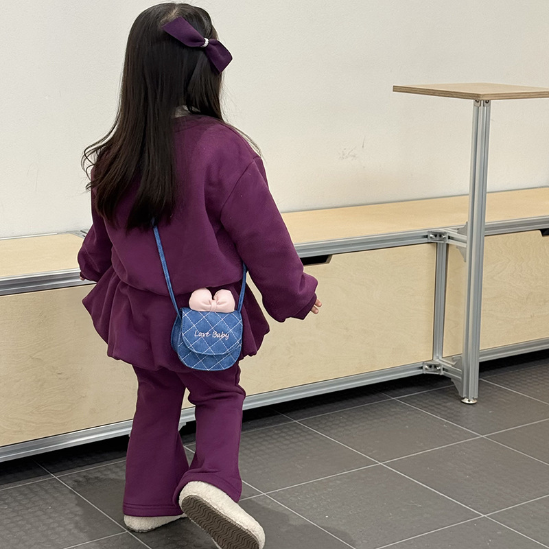 Bolsas de niños de comercio exterior transfronterizo nuevo gatito lindo arco mini bolso de hombro de moda bolso de cambio de bebé Ringer