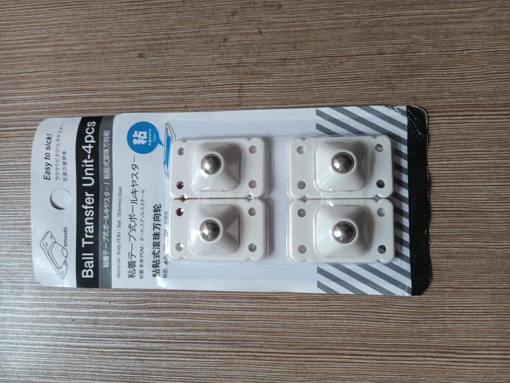 Plástico universal rueda de almacenamiento rack pequeña rueda deslizante caja de almacenamiento rodillo adhesivo pequeña polea fábrica al por mayor