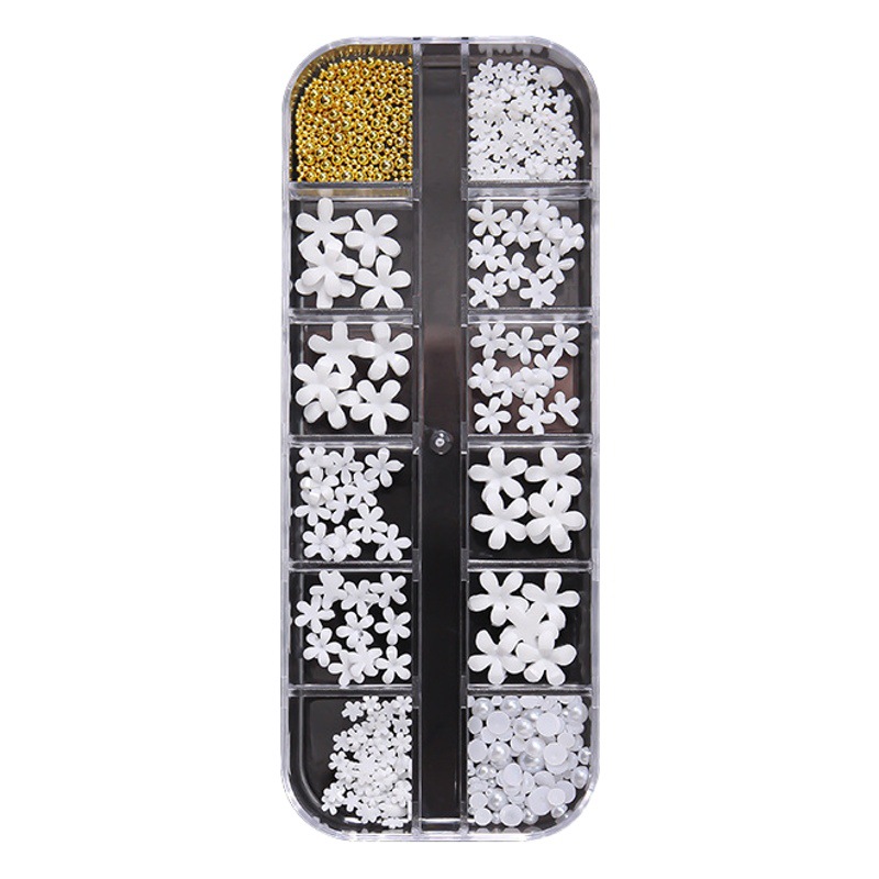 2021 celebridad de Internet 12 caja de cuadrícula estilo japonés Flor de cinco pétalos bola de acero perla flor blanca tamaño tridimensional joyería de uñas mixta