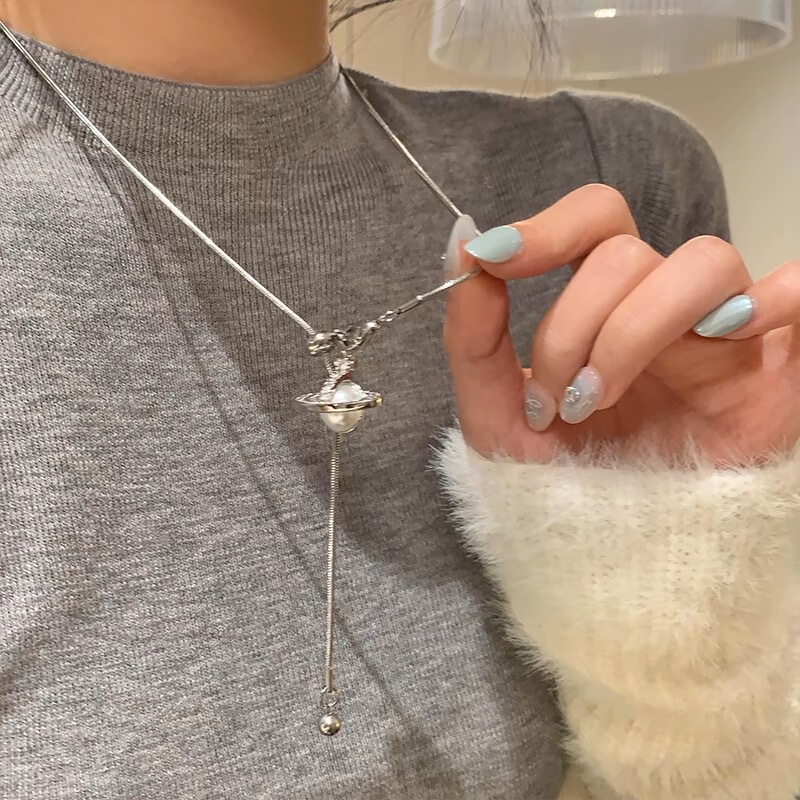Autumn and winter fashionable pearl planet pendant tassel sweater chain women's high-end unique long drawable neck chain necklace