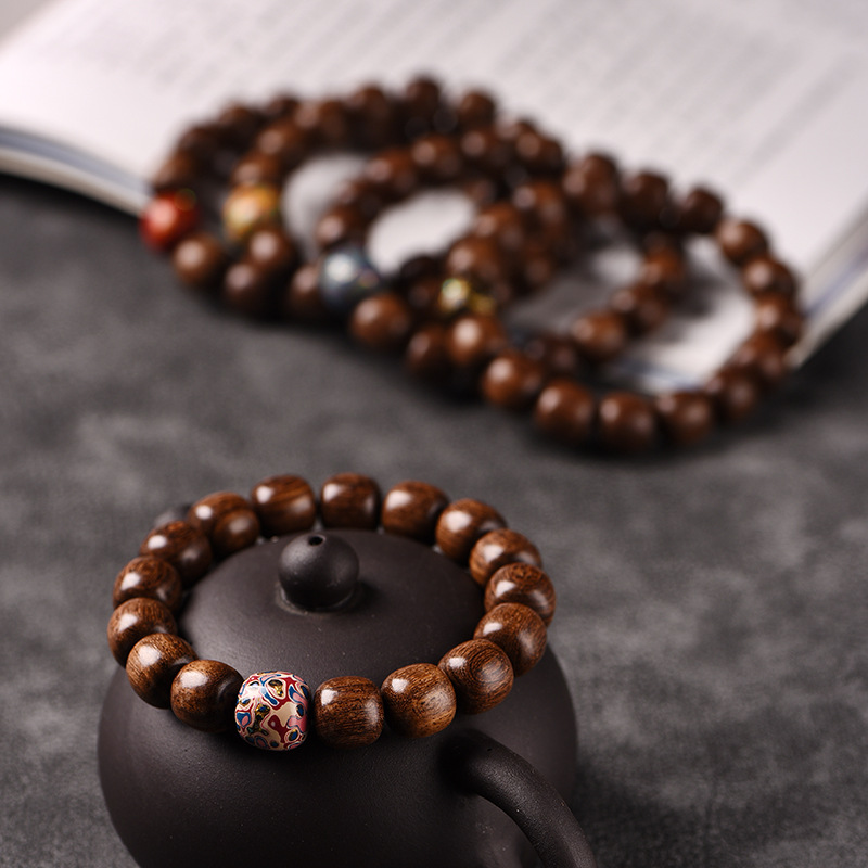 rosary with round beads golden sandalwood walnut
