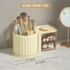 Cream rotating dressing table, pens holder